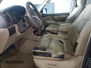 2004 Toyota Land Cruiser z VIN JTEHT05J042063603, wystawiony jako Copart lot #50366005 z przebiegiem 226 355 mil mil oraz Tytuł czysty. Historia ofert i sprzedaży dostępna na DreamBid. Obrazek 7.