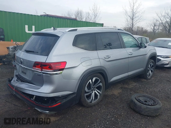 2023 Volkswagen Atlas SEL z VIN 1V2BR2CA9PC502866, wystawiony jako IAAI lot #41877062 z przebiegiem 18 605 mil mil oraz . Historia ofert i sprzedaży dostępna na DreamBid. Obrazek 4.
