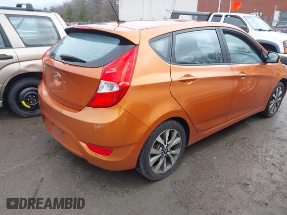 2015 Hyundai Accent Sport with VIN KMHCU5AE3FU205849, listed as a IAAI auction lot 41827093 with 112,980 mi miles. Bid and sale history available at carsss.com. Image 4.