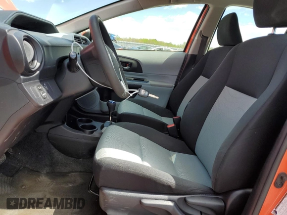 2012 Toyota Prius c One with VIN JTDKDTB35C1030051, listed as a Copart auction lot 52895065 with 94,529 mi miles and Salvage Title. Bid and sale history available at carsss.com. Image 7.