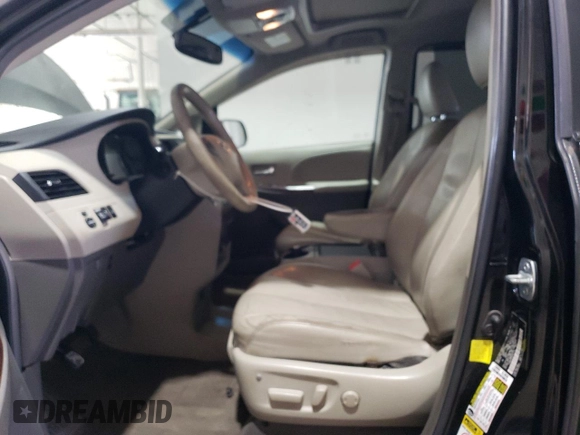 2012 Toyota Sienna XLE with VIN 5TDDK3DC9CS047319, listed as a Copart auction lot 53173405 with 198,654 mi miles and Salvage Title. Bid and sale history available at carsss.com. Image 7.