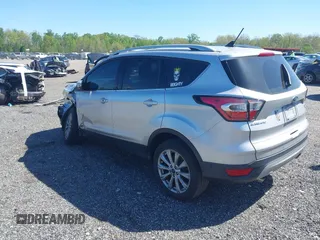2018 Ford Escape Titanium with VIN 1FMCU9J96JUA33500, listed as a IAAI auction lot 42121736 with 105,430 mi miles and . Bid and sale history available at DreamBid. Image 3.