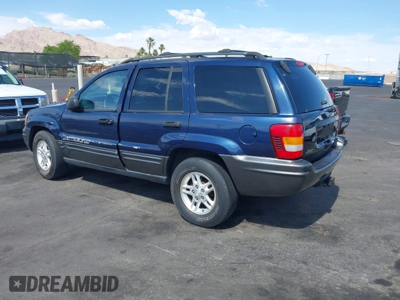 2004 Jeep Grand Cherokee with VIN 1J4GX48J74C283123, listed as a IAAI auction lot 42477393 with 182,491 mi miles and . Bid and sale history available at DreamBid. Image 3.