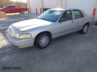 2007 Mercury Grand Marquis LS with VIN 2MEFM75V87X628541, listed as a IAAI auction lot 41051994 with 183,363 mi miles. Bid and sale history available at carsss.com. Image 2.