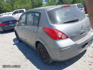 2008 Nissan Versa 1.8 S with VIN 3N1BC13E08L406990, listed as a IAAI auction lot 42080031 with 175,008 mi miles. Bid and sale history available at carsss.com. Image 3.