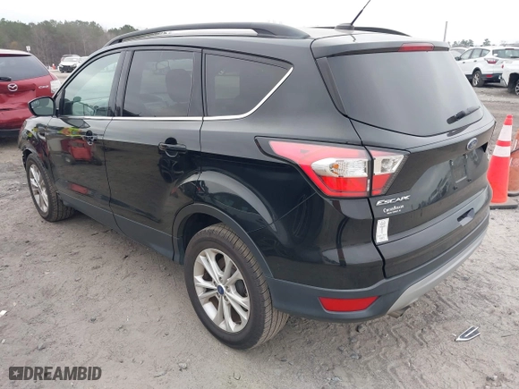 2018 Ford Escape SE with VIN 1FMCU0GD1JUB03329, listed as a IAAI auction lot 41040155 with 61,006 mi miles. Bid and sale history available at carsss.com. Image 3.