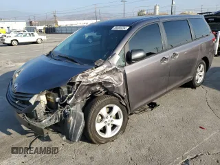 2012 Toyota Sienna with VIN 5TDKA3DC6CS010187, listed as a Copart auction lot 86885234 with 145,745 mi miles and Salvage Title. Bid and sale history available at DreamBid. Image 1.