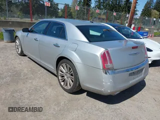 2012 Chrysler 300 with VIN 2C3CCAET2CH207796, listed as a IAAI auction lot 42029639 with 142,929 mi miles. Bid and sale history available at carsss.com. Image 3.
