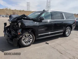 2023 GMC Yukon XL SLT z VIN 1GKS2GKD3PR282110, wystawiony jako Copart lot #52950425 z przebiegiem 99 147 mil mil oraz Szkody całkowita. Historia ofert i sprzedaży dostępna na DreamBid. Obrazek 1.