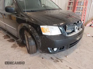 2010 Dodge Grand Caravan Crew with VIN 2D4RN6DX1AR438135, listed as a IAAI auction lot 41734378 with 57,041 mi miles and . Bid and sale history available at DreamBid. Image 13.