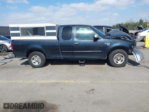 2002 Ford F-150 XL with VIN 1FTRX17L02NB79722, listed as a IAAI auction lot 41538404 with 202,050 mi miles. Bid and sale history available at carsss.com. Image 14.