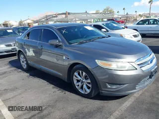 2011 Ford Taurus SEL with VIN 1FAHP2EW9BG158991, listed as a IAAI auction lot 41530132 with 153,323 mi miles. Bid and sale history available at carsss.com. Image 1.