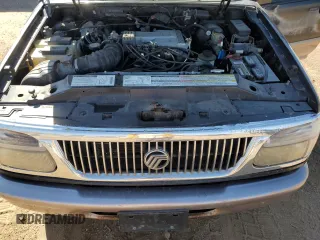 1997 Mercury Mountaineer z VIN 4M2DU52P5VUJ58731, wystawiony jako Copart lot #69710404 z przebiegiem 266 522 mil mil oraz Tytuł czysty. Historia ofert i sprzedaży dostępna na DreamBid. Obrazek 12.