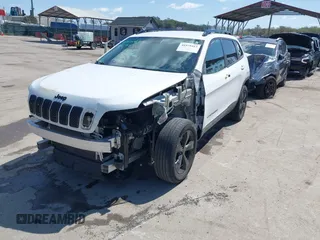 2020 Jeep Cherokee Altitude with VIN 1C4PJMLN7LD554191, listed as a IAAI auction lot 41975413 with 55,923 mi miles. Bid and sale history available at carsss.com. Image 2.