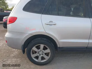 2009 Hyundai Santa Fe SE with VIN 5NMSH13E59H236932, listed as a IAAI auction lot 41846012 with 227,118 mi miles. Bid and sale history available at carsss.com. Image 12.