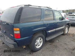 2005 GMC Yukon SLT with VIN 1GKEK13T15R196436, listed as a IAAI auction lot 41952646 with 247,487 mi miles. Bid and sale history available at carsss.com. Image 4.