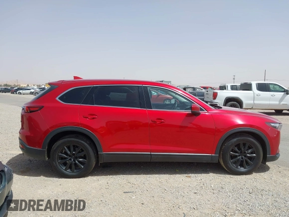 2016 Mazda CX-9 Touring z VIN JM3TCACY9G0102524, wystawiony jako IAAI lot #42305452 z przebiegiem 76 892 mil mil oraz . Historia ofert i sprzedaży dostępna na DreamBid. Obrazek 13.