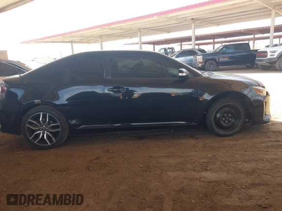 2014 Scion tC z VIN JTKJF5C75E3069757, wystawiony jako IAAI lot #42175725 z przebiegiem 191 054 mil mil oraz . Historia ofert i sprzedaży dostępna na DreamBid. Obrazek 13.