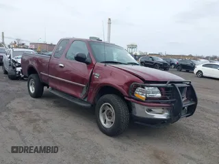 1998 Ford F-150 XL with VIN 1FTDX18W9WKA01690, listed as a IAAI auction lot 41944734 with 176,359 mi miles. Bid and sale history available at carsss.com. Image 6.