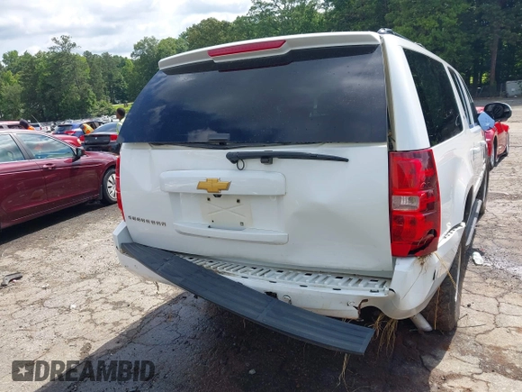 2014 Chevrolet Suburban LT with VIN 1GNSCJE07ER211222, listed as a IAAI auction lot 42428084 with 214,712 mi miles and . Bid and sale history available at DreamBid. Image 16.