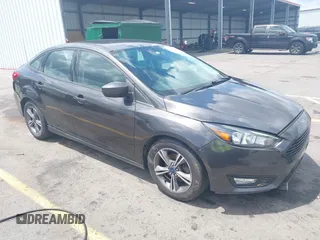 2018 Ford Focus SE with VIN 1FADP3FE2JL263954, listed as a IAAI auction lot 42480748 with 111,059 mi miles and . Bid and sale history available at DreamBid. Image 1.