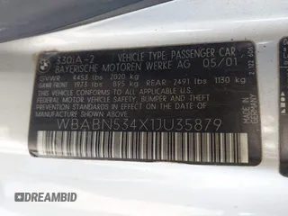 2001 BMW 3 Series 330Ci with VIN WBABN534X1JU35879, listed as a IAAI auction lot 41596963 with 206,953 mi miles. Bid and sale history available at carsss.com. Image 9.