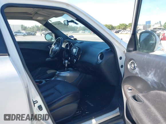 2013 Nissan Juke SV with VIN JN8AF5MV4DT215041, listed as a IAAI auction lot 41863707 with 88,331 mi miles. Bid and sale history available at carsss.com. Image 5.