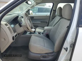 2012 Ford Escape XLT с VIN 1FMCU0DGXCKA23430, выставлен на аукционе Copart как лот 59546645 с пробегом 128 369 миль миль и Списание • Salvage title. История ставок и продаж доступна на DreamBid. Изображение 7.