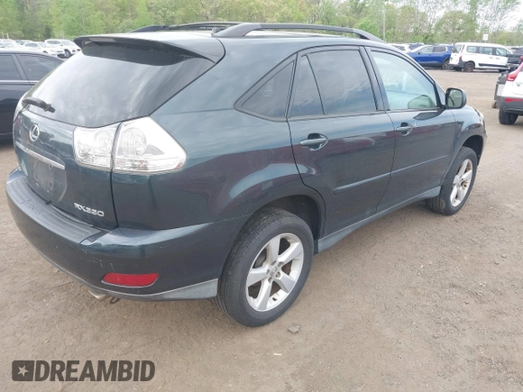 2006 Lexus RX 330 with VIN 2T2HA31U56C090677, listed as a IAAI auction lot 42182540 with 216,676 mi miles. Bid and sale history available at carsss.com. Image 4.