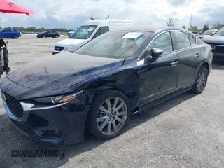 2024 Mazda 3 S Preferred with VIN 3MZBPACM5RM414908, listed as a IAAI auction lot 42167530 with 24,220 mi miles and . Bid and sale history available at carsss.com. Image 2.