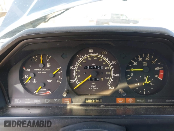 1987 Mercedes-Benz 300 with VIN WDBEA30D8HA397811, listed as a IAAI auction lot 41868336 with 124,720 mi miles. Bid and sale history available at carsss.com. Image 7.