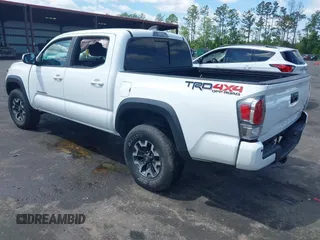 2020 Toyota Tacoma SR5 z VIN 5TFCZ5AN5LX231157, wystawiony jako IAAI lot #42045534 z przebiegiem 84 099 mil mil oraz . Historia ofert i sprzedaży dostępna na DreamBid. Obrazek 3.
