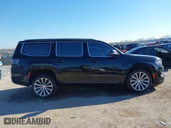 2022 Jeep Grand Wagoneer Series II with VIN 1C4SJVFJ6NS191874, listed as a IAAI auction lot 41141264 with 74,624 mi miles and . Bid and sale history available at DreamBid. Image 13.