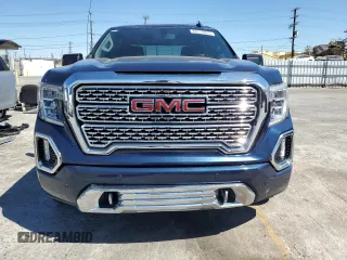2022 GMC Sierra 1500 Denali with VIN 3GTU9FEDXNG213711, listed as a Copart auction lot 64112245 with 63,476 mi miles and Salvage title. Bid and sale history available at DreamBid. Image 5.