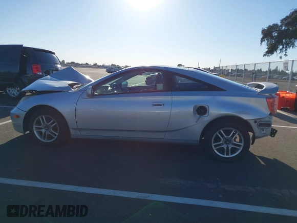 2004 Toyota Celica GT with VIN JTDDR32T740171821, listed as a IAAI auction lot 40619278 with 188,068 mi miles and . Bid and sale history available at DreamBid. Image 14.