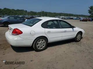 2005 Ford Taurus SE z VIN 1FAHP53U65A184099, wystawiony jako Copart lot #60960015 z przebiegiem Nie podano mil oraz Szkoda całkowita • Salvage title. Historia ofert i sprzedaży dostępna na DreamBid. Obrazek 3.
