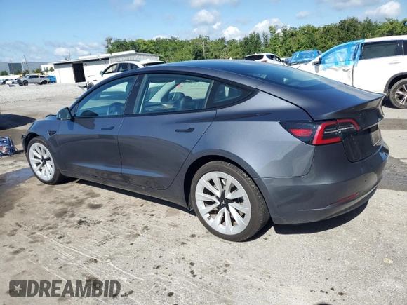 2023 Tesla Model 3 with VIN 5YJ3E1EA7PF456613, listed as a Copart auction lot 56940255 with 35,920 mi miles and Non repairable. Bid and sale history available at DreamBid. Image 2.