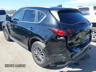 2019 Mazda CX-5 Sport with VIN JM3KFABM7K1579747, listed as a IAAI auction lot 41965097 with 151,042 mi miles and . Bid and sale history available at DreamBid. Image 3.