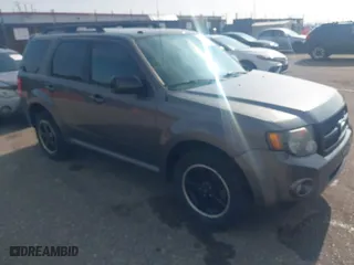 2011 Ford Escape XLT with VIN 1FMCU9D78BKC39019, listed as a IAAI auction lot 41903813 with 226,401 mi miles. Bid and sale history available at carsss.com. Image 1.