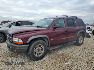 2002 Dodge Durango Sport z VIN 1B4HR38N62F216491, wystawiony jako Copart lot #84088604 z przebiegiem 319 959 mil mil oraz Szkoda całkowita • Salvage title. Historia ofert i sprzedaży dostępna na DreamBid. Obrazek 1.