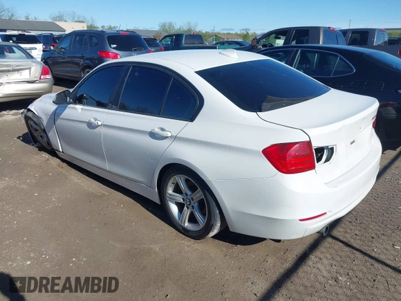 2015 BMW 3 Series 320i with VIN WBA3B1G57FNT02019, listed as a IAAI auction lot 42128277 with 218,621 mi miles and . Bid and sale history available at DreamBid. Image 3.
