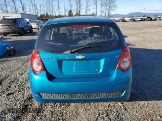 2009 Chevrolet Aveo 1LT z VIN KL1TD66E69B668367, wystawiony jako Copart lot #47278585 z przebiegiem 49 187 mil mil oraz Czysty tytuł • Clean title. Historia ofert i sprzedaży dostępna na DreamBid. Obrazek 6.