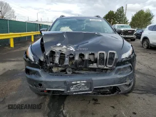 2015 Jeep Cherokee Trailhawk with VIN 1C4PJMBS9FW521872, listed as a Copart auction lot 55338955 with 146,602 mi miles and Salvage title. Bid and sale history available at DreamBid. Image 5.