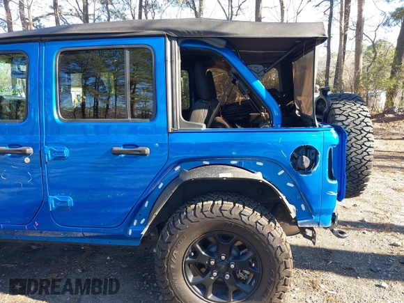 2021 Jeep Wrangler Unlimited Sport S with VIN 1C4HJXDG1MW722743, listed as a IAAI auction lot 41237900 with 35,662 mi miles and . Bid and sale history available at DreamBid. Image 18.