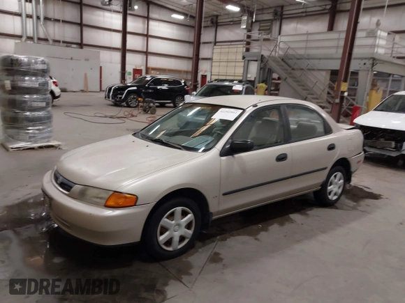 1998 Mazda Protege DX z VIN JM1BC1419W0171802, wystawiony jako IAAI lot #42202861 z przebiegiem 252 304 mil mil oraz . Historia ofert i sprzedaży dostępna na DreamBid. Obrazek 17.