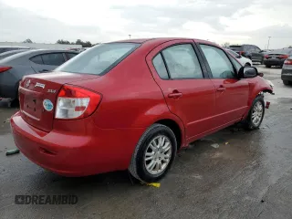 2013 Suzuki SX4 LE with VIN JS2YC5A36D6101956, listed as a Copart auction lot 84450374 with 61,704 mi miles and Salvage Title. Bid and sale history available at carsss.com. Image 3.