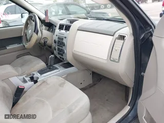 2010 Mercury Mariner with VIN 4M2CN8B74AKJ02926, listed as a IAAI auction lot 41890612 with 240,322 mi miles. Bid and sale history available at carsss.com. Image 5.