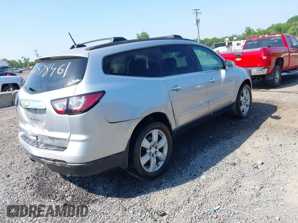 2016 Chevrolet Traverse LT with VIN 1GNKRGKD3GJ275039, listed as a IAAI auction lot 42578461 with 131,843 mi miles and . Bid and sale history available at DreamBid. Image 4.