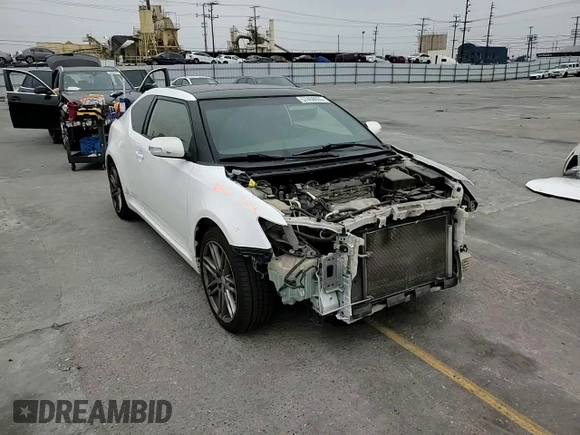 2013 Scion tC z VIN JTKJF5C77D3056779, wystawiony jako Copart lot #57459935 z przebiegiem 157 420 mil mil oraz Szkoda całkowita • Salvage title. Historia ofert i sprzedaży dostępna na DreamBid. Obrazek 13.