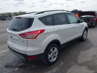 2016 Ford Escape SE with VIN 1FMCU0GX4GUC55365, listed as a IAAI auction lot 41901838 with 72,913 mi miles. Bid and sale history available at carsss.com. Image 4.